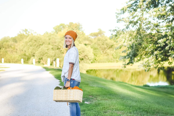 b.e.happe owner, Brooke Happe holding yarn. How to run a product business from the road