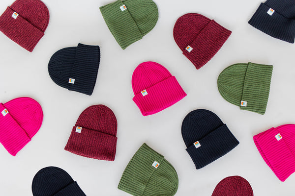 ribbed knit beanies from behappe flat lay of colorful cuffed beanies