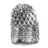 Knitted beanie with a brand label on a white background