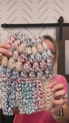rainbow crochet slouch hat with a puff stitch pattern