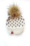 handmade knit winter hat beanie with faux fur pom pom; off white beanie with grey mini heart; pom pom winter beanie with mini hearts; b.e.happe handmade knit hat with hearts; b.e.happe knit winter beanie pom pom; mommy and me winter hat set; mommy and me matching winter hats; knit heart pom pom hat